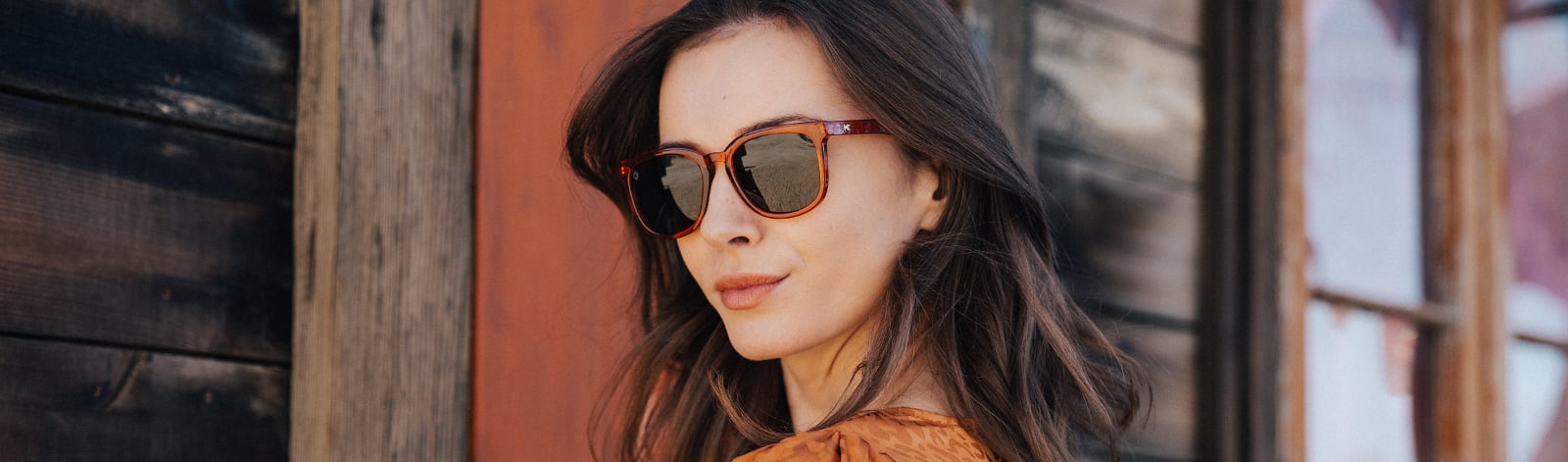 Woman wearing Knockaround Desert Glaze Paso Robles