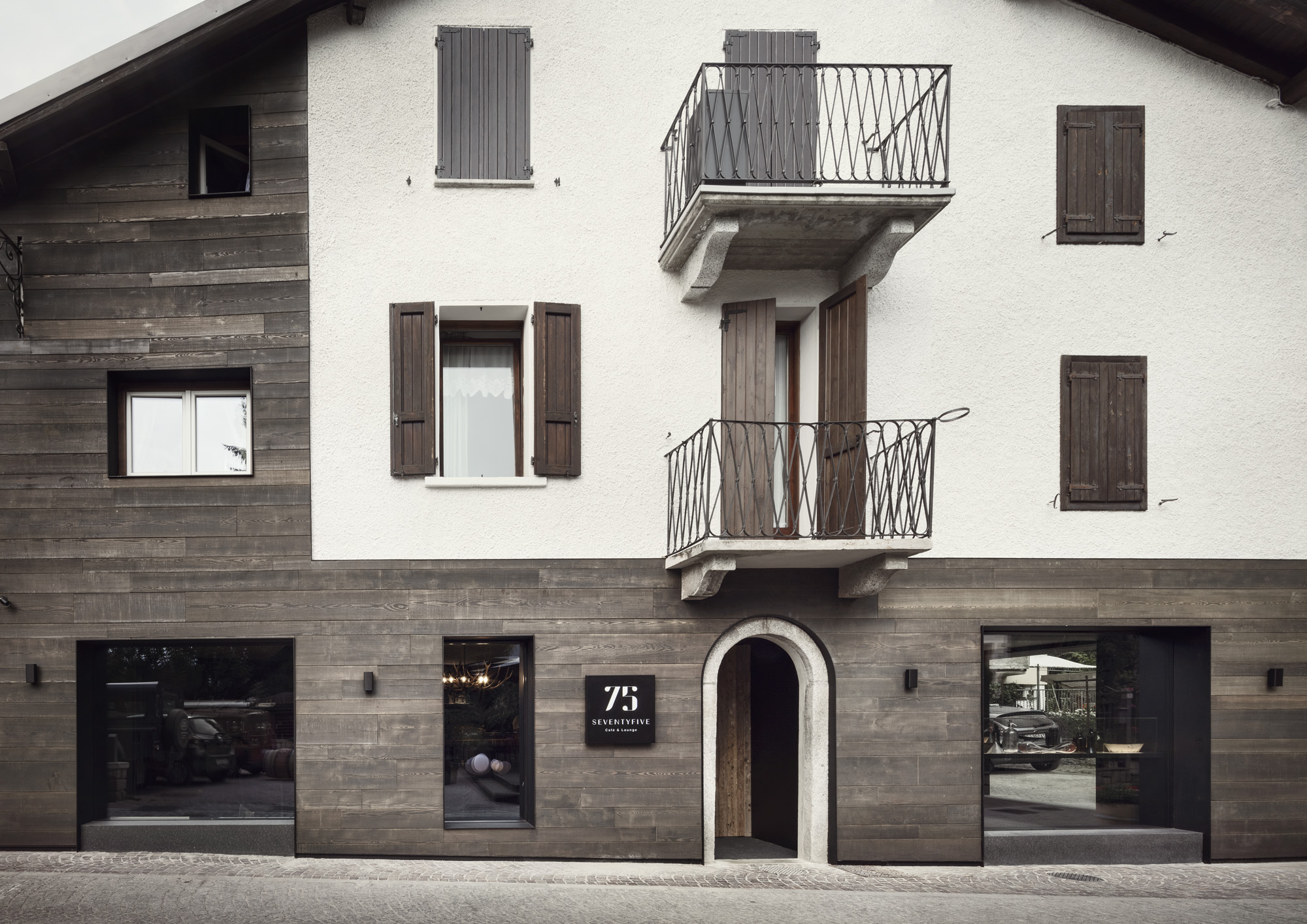 The 75 Café and Lounge is located inside a typical village house in the mountain resort of Ponte di Legno in Brescia, northern Italy. Photography © Thomas Pagani. 