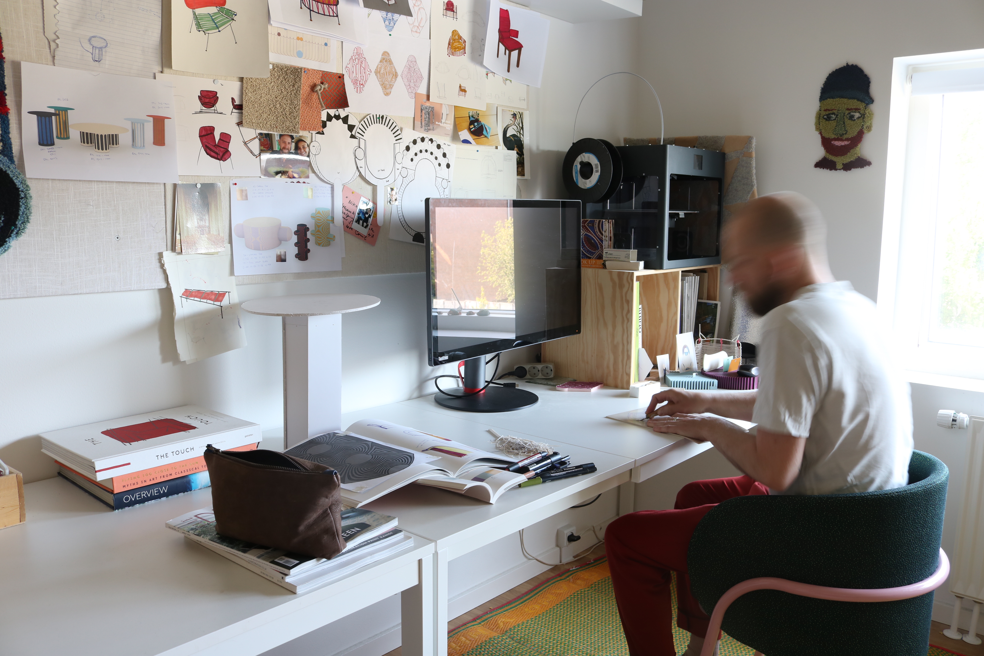 Nikolai's home studio surrounded by sketches and finished works. Photo c/o Nikolai Kotlarczyk.