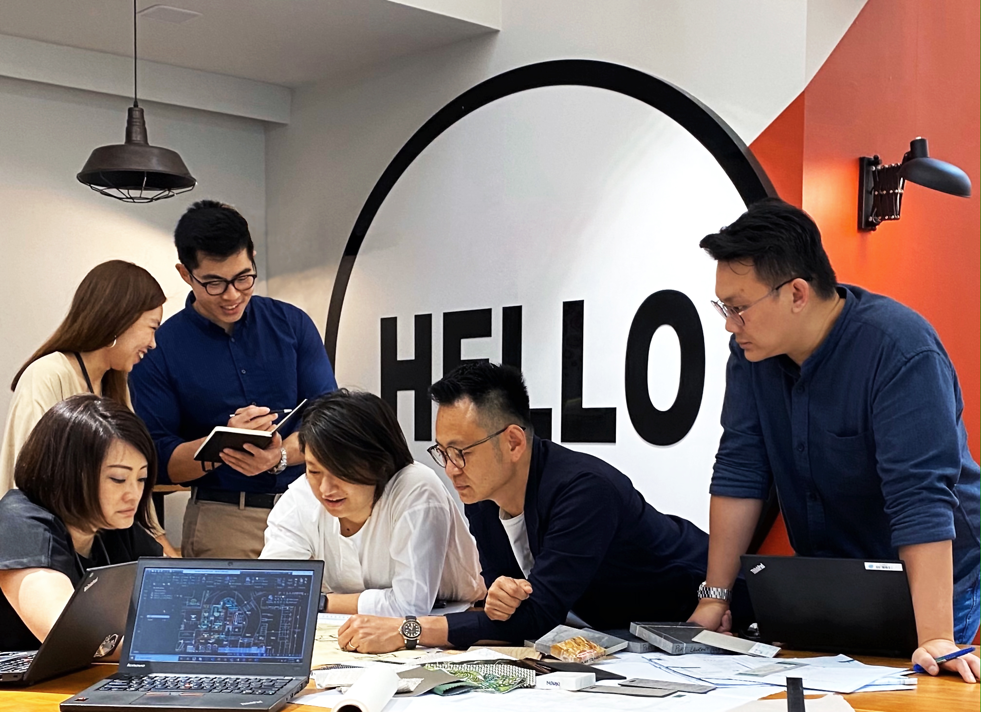 Kian Liew with members of his design studio team in Singapore.