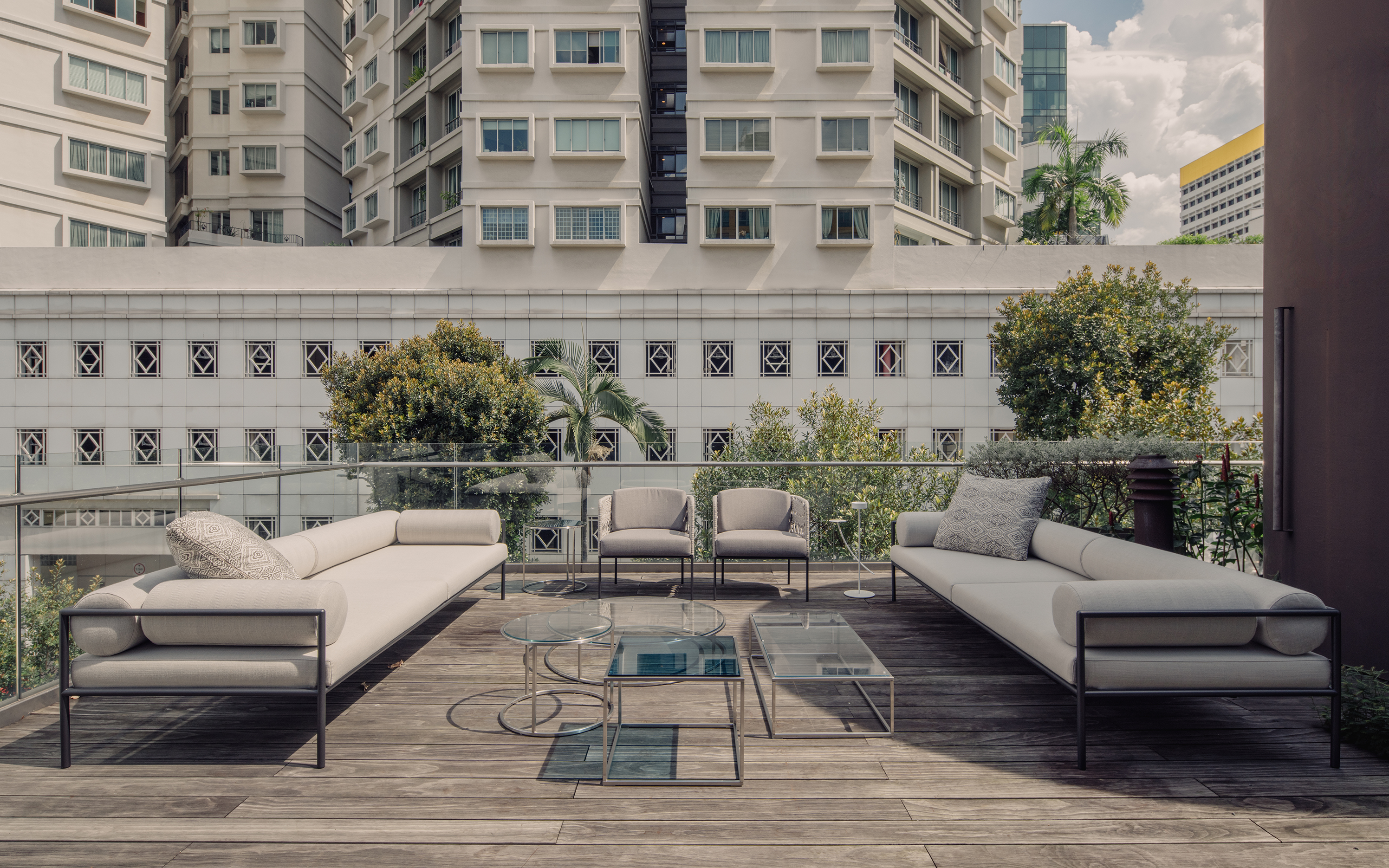 Agra outdoor sofa collection by David Lopez Quincoces, the Ile table collection by Piero Lissoni and the Poncho armchairs by Lucidi Pevere for Living Divani. Image © Khoo Guo Jie, Khoogj.
