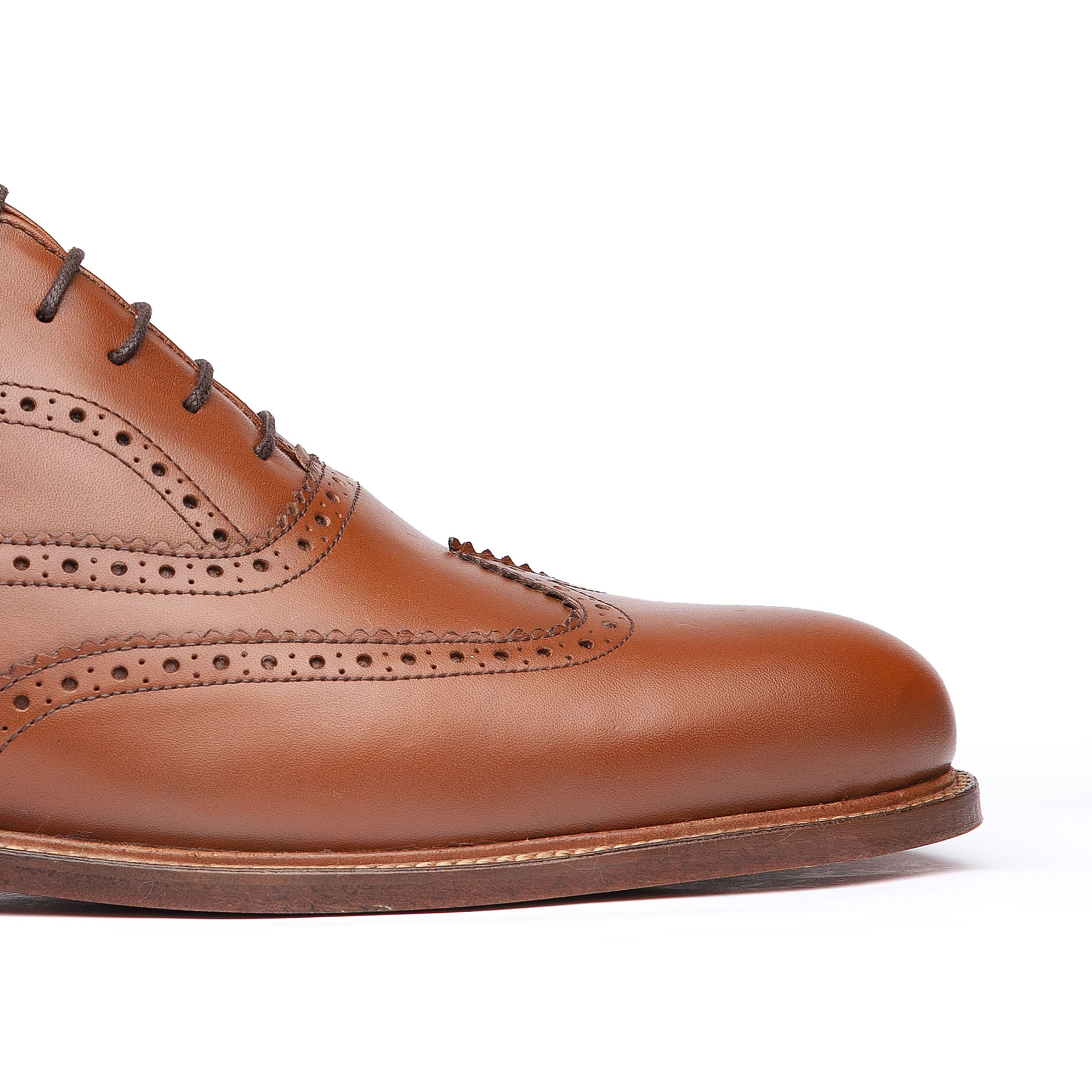 The Simba oxford wingtip in tan with calf leather from the finest tanneries with storm leather welt to prevent water from entering.