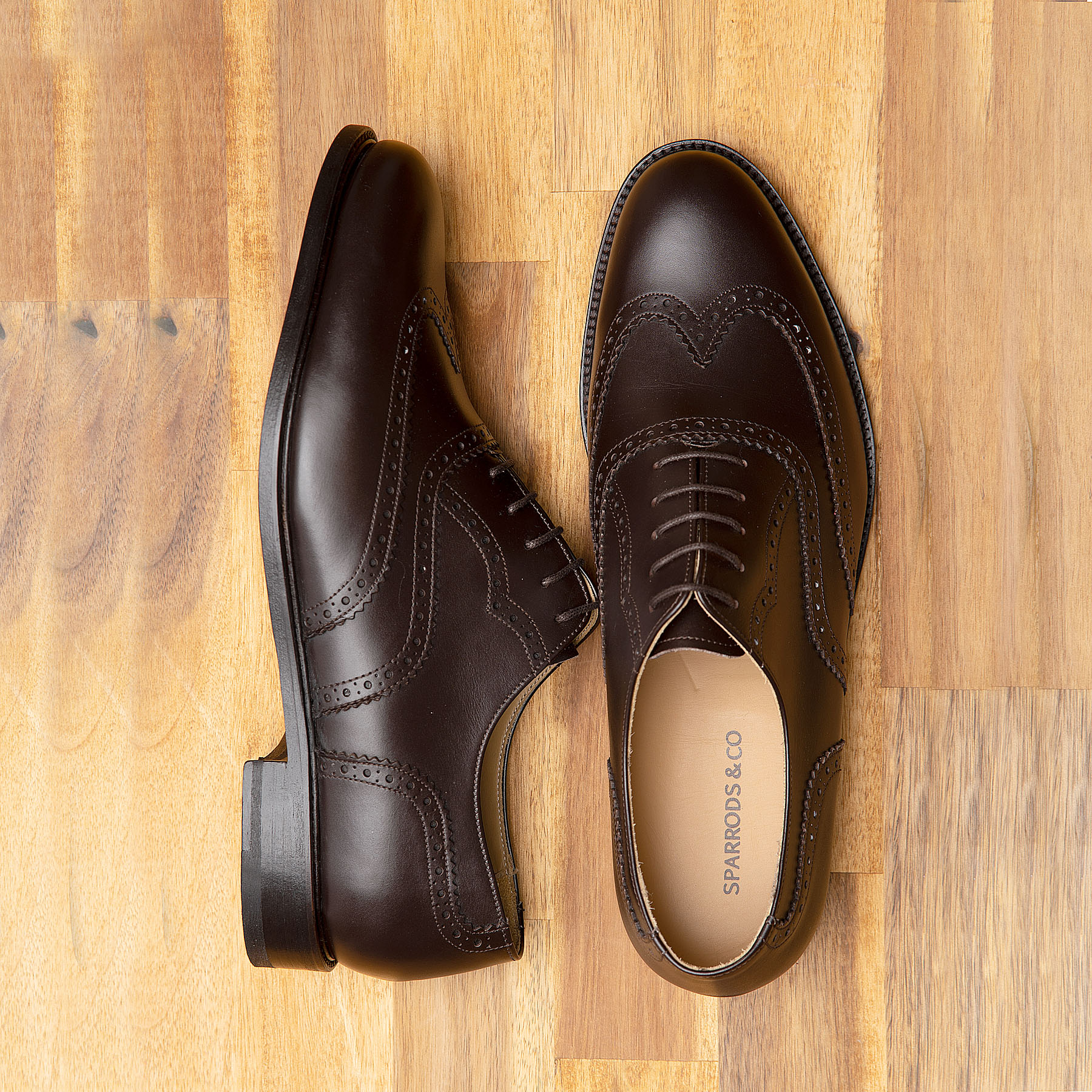 The Simba oxford brogues leather shoes in chocolate, crafted by Artisan using traditional shoe making steps with premium leather materials.