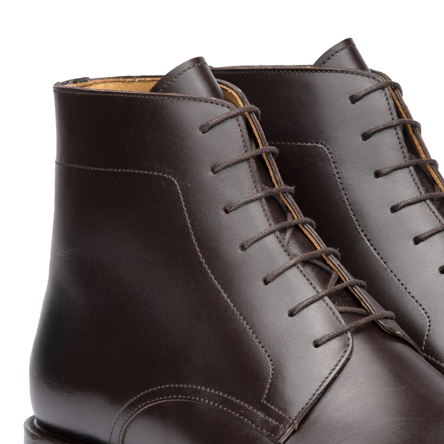 The Kingsman plain toe lace up boot, made from aniline dyed black full grain calfskin leather with cushioned insole and storm leather welt