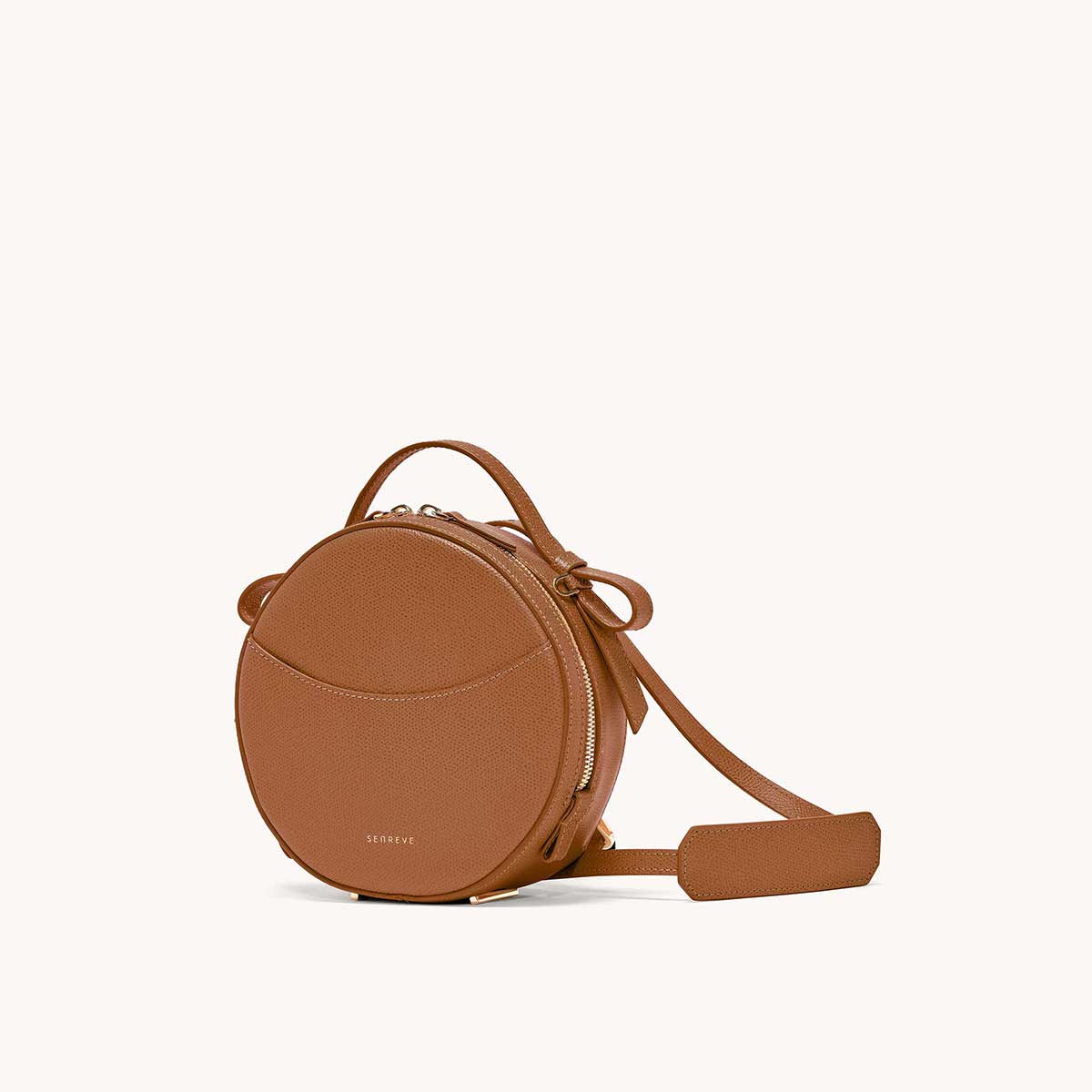 circa bag pebbled chestnut side view with leather strap