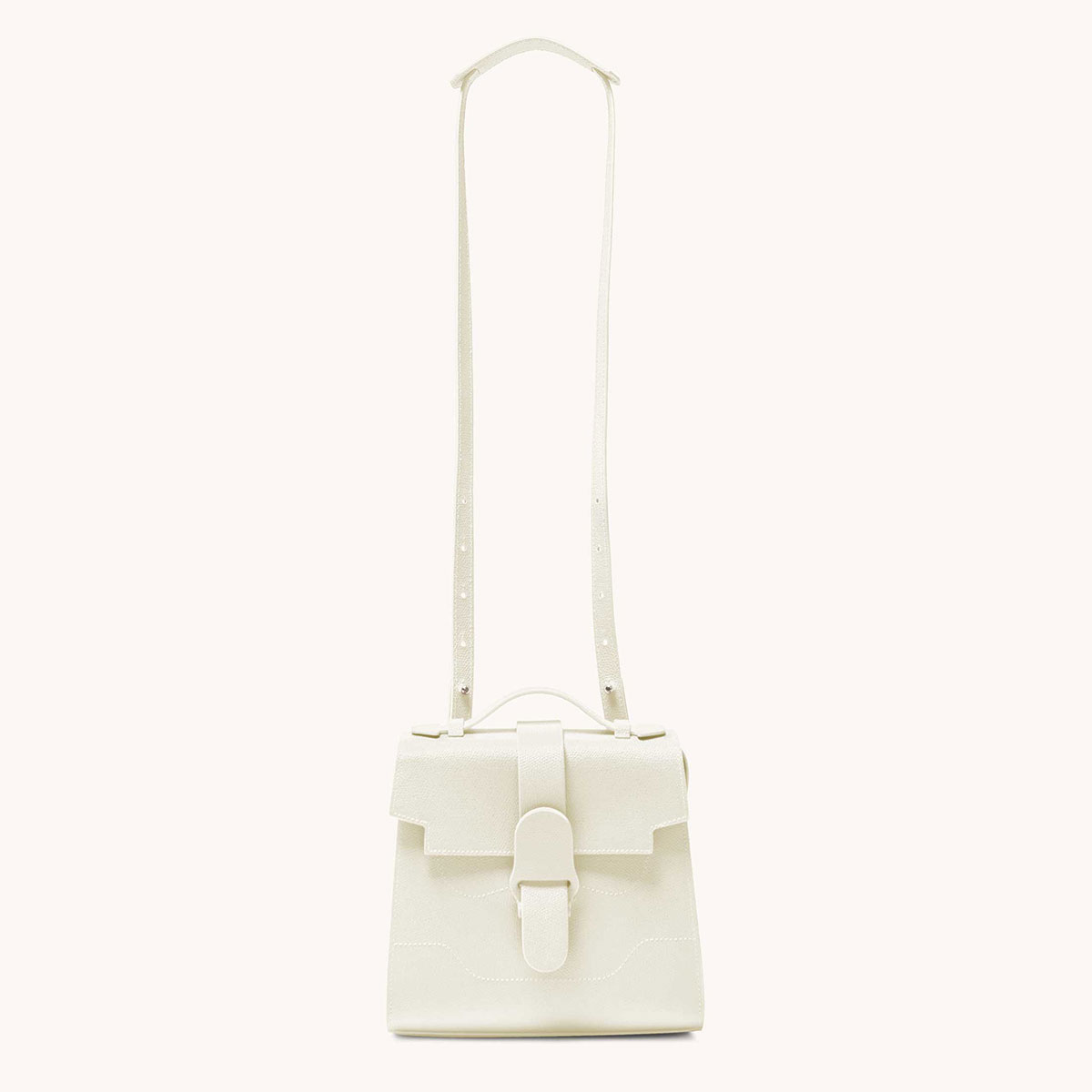 alunna bag pebbled cream side view with long strap