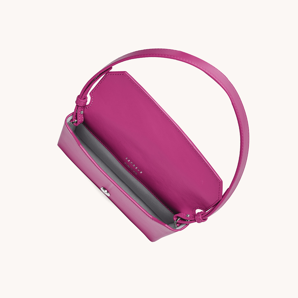 square saddle bag in barbiecore pink leather top view of interior