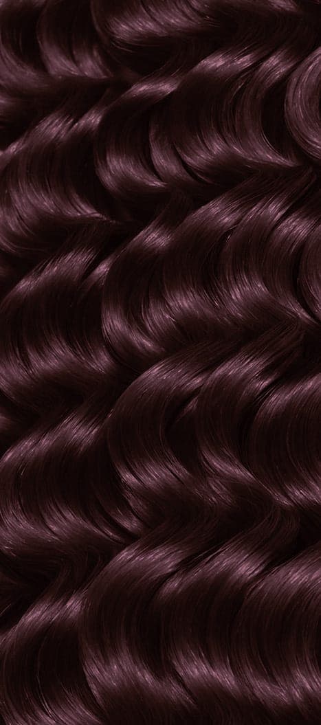 Two bottles and packaging for All About Curls Permanent Color in shade 3V Twisted Plum.