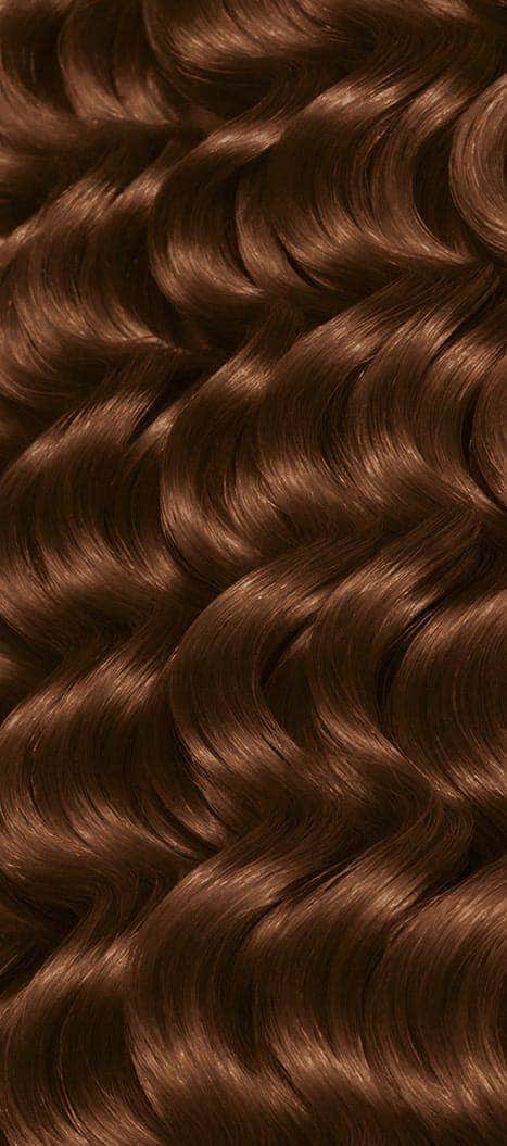 Two bottles and packaging for All About Curls Permanent Color in shade 6WB Cinnamon Roll.