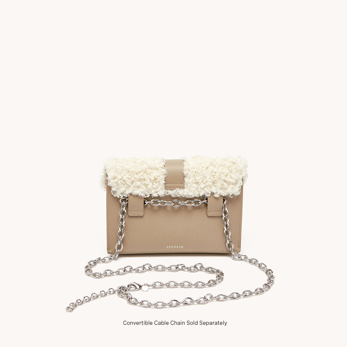 aria belt bag faux shearling sand back view with silver chain