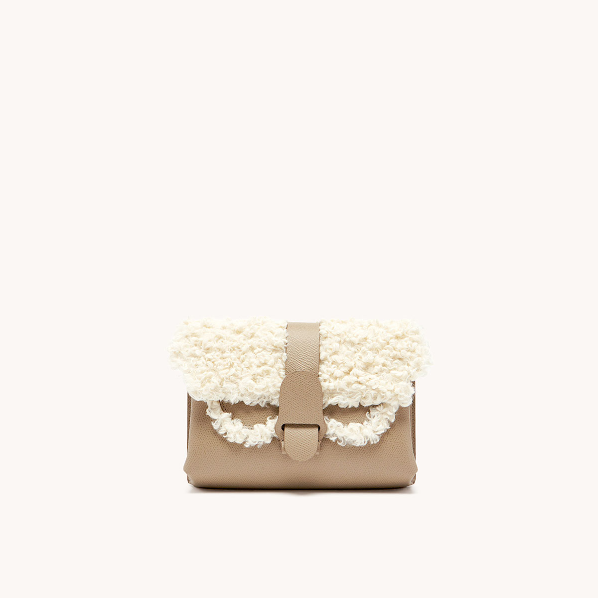 aria belt bag faux shearling sand front view with belt removed