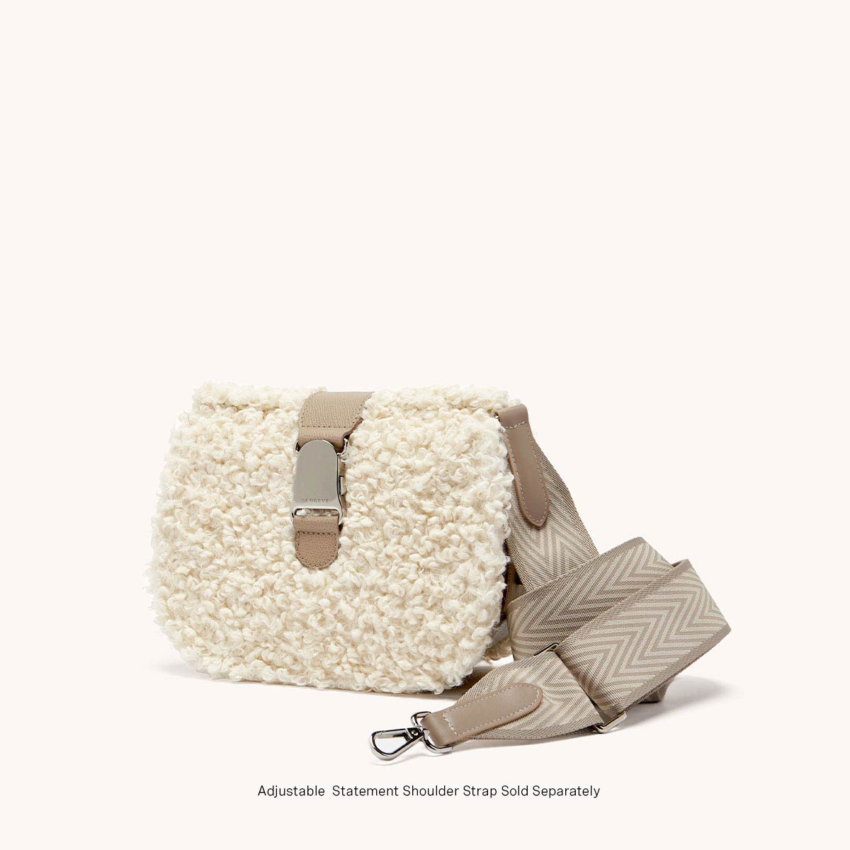 cadence crossbody faux shearling sand side view with grey shoulder strap