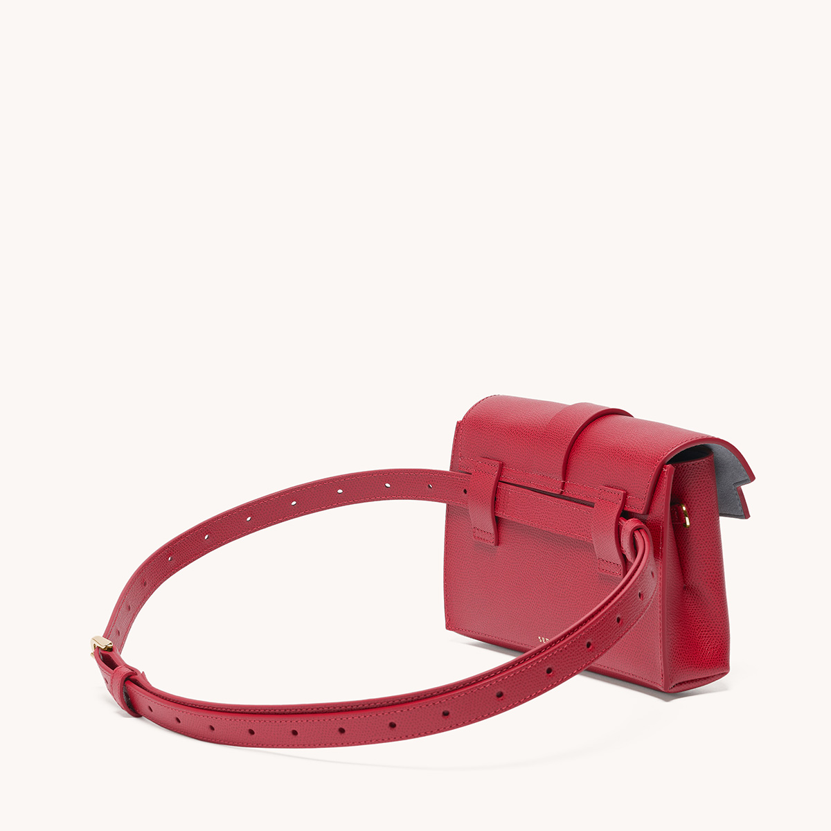 aria elevee belt bag pebbled scarlet side view with strap