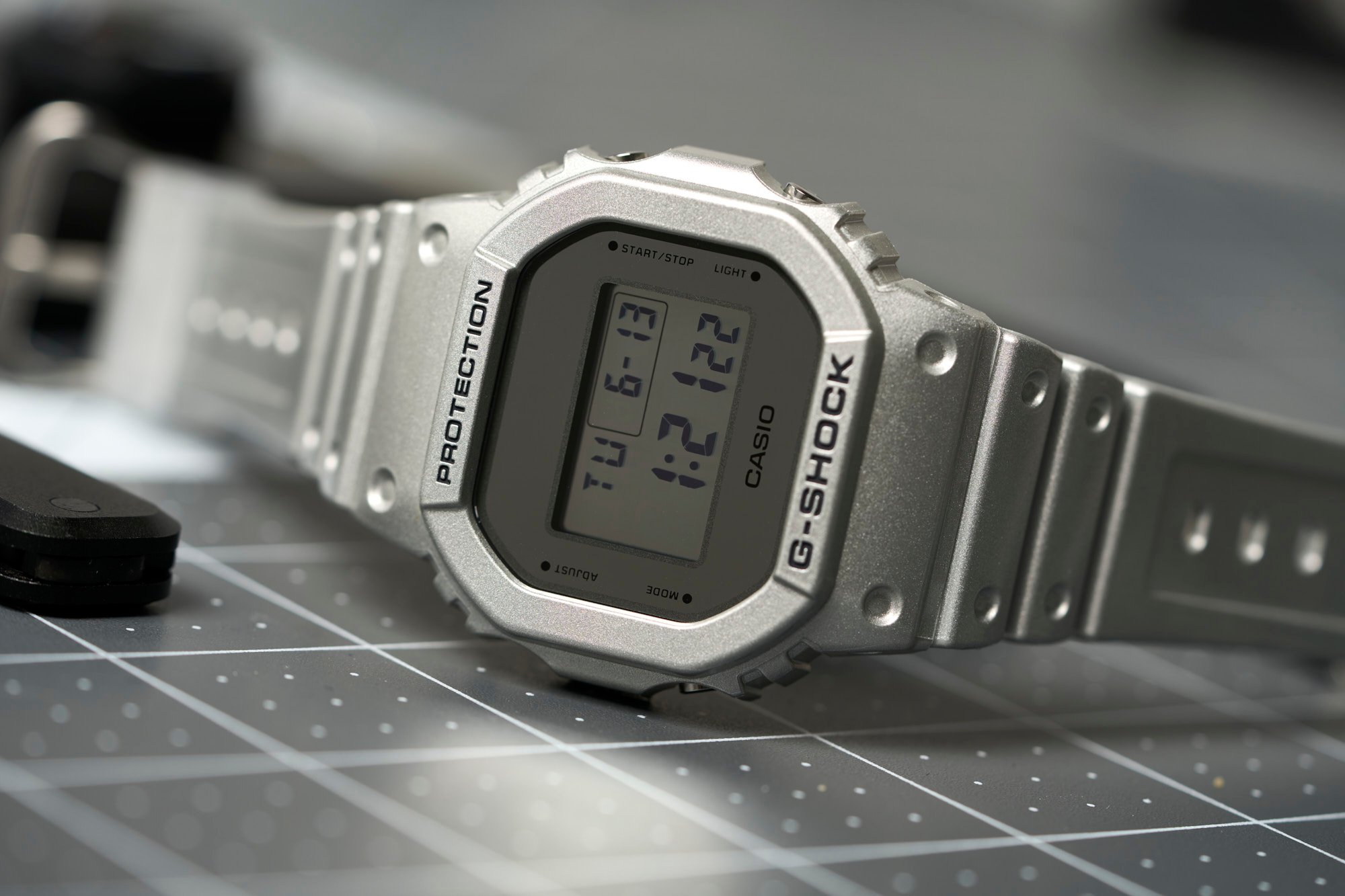 G shock dw 5600 silver hotsell