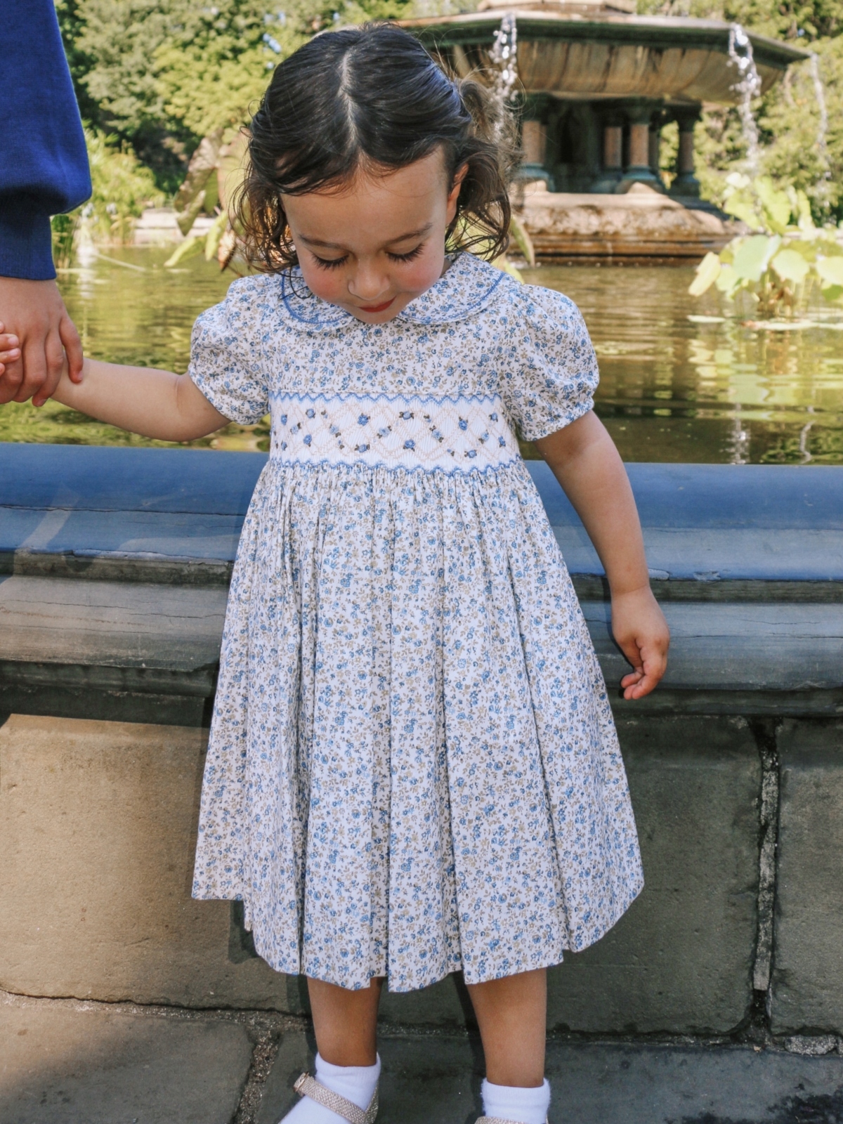 young girl wearing luli & me dress in central park