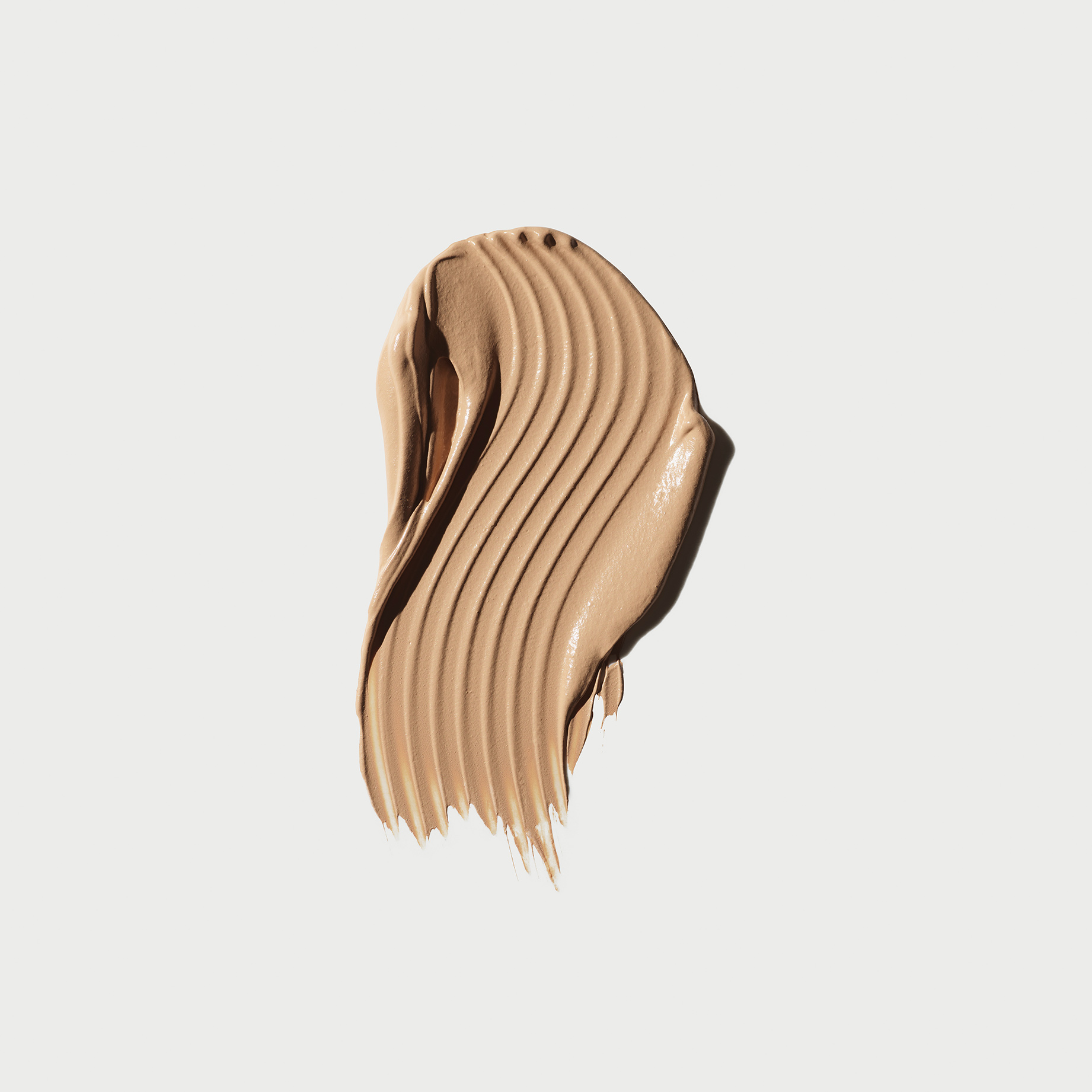 Product swatch of the Softlight Luminous Hydrating Concealer in shade 070