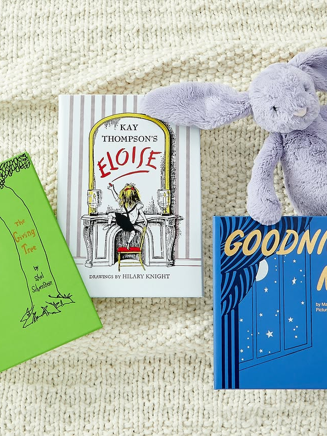 three graphic image books laying flat