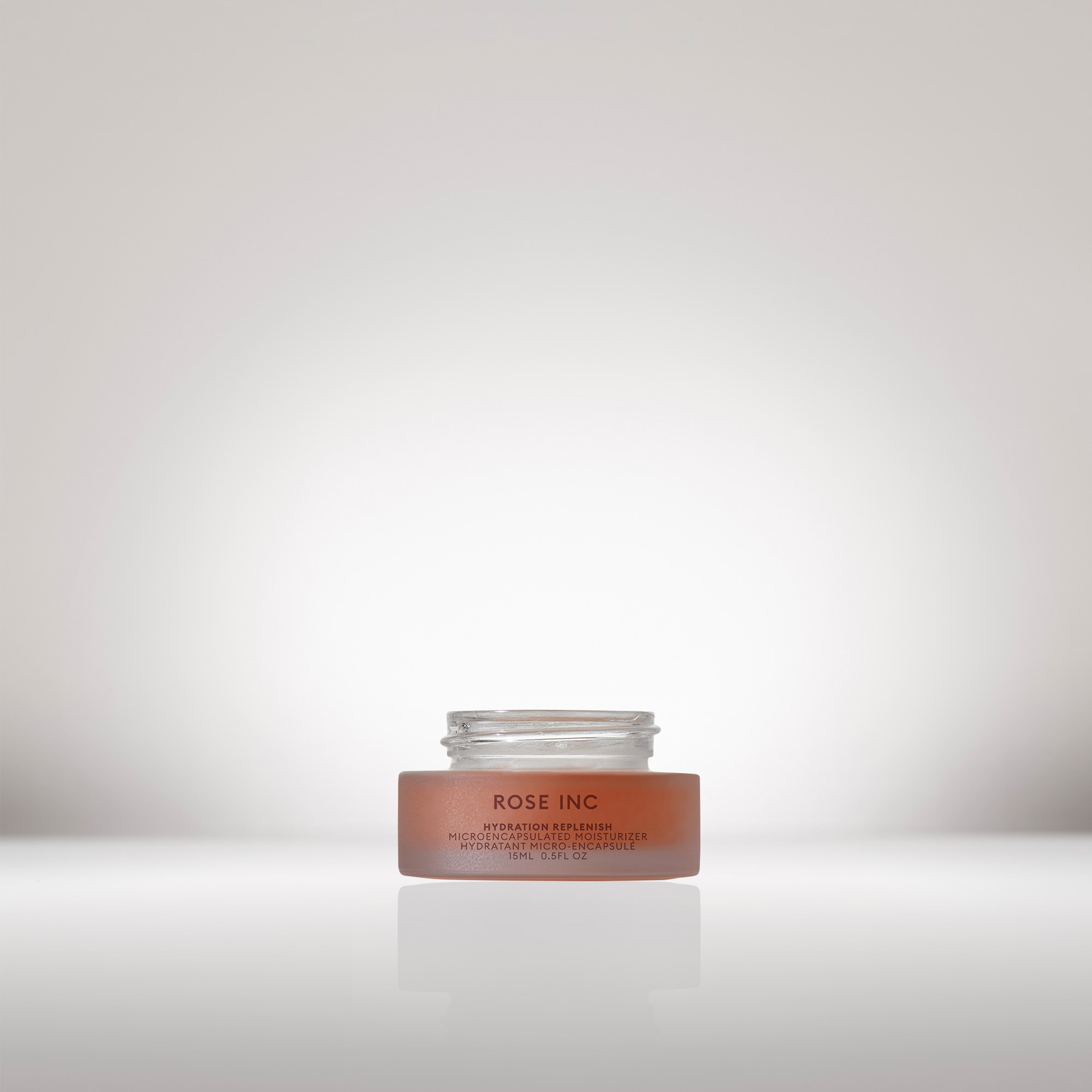 Image of the Travel Size Hydration Replenish Moisturizer open with the cap off