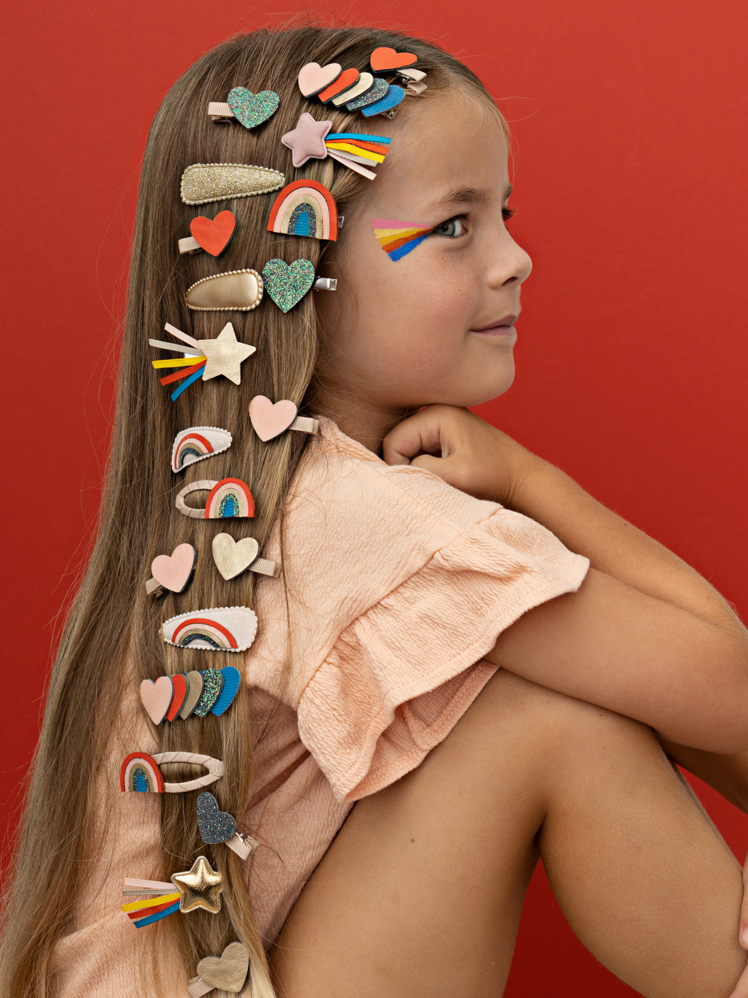 girl wearing 20 hair clips in her hair