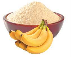 a bowl of flour and bananas