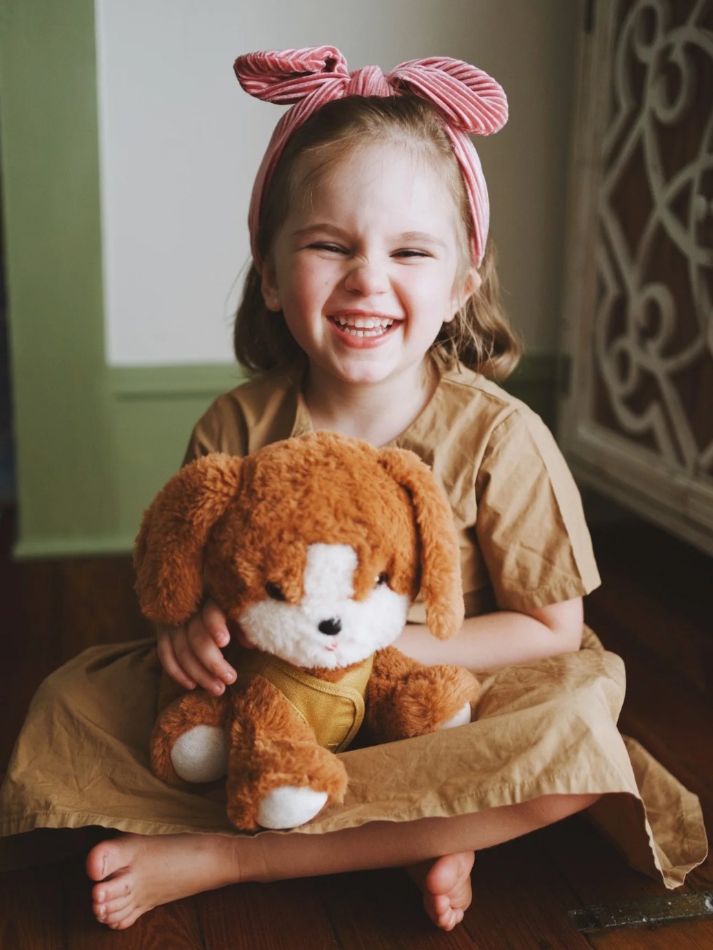 girl holding olli ella dinkum dogs buddy