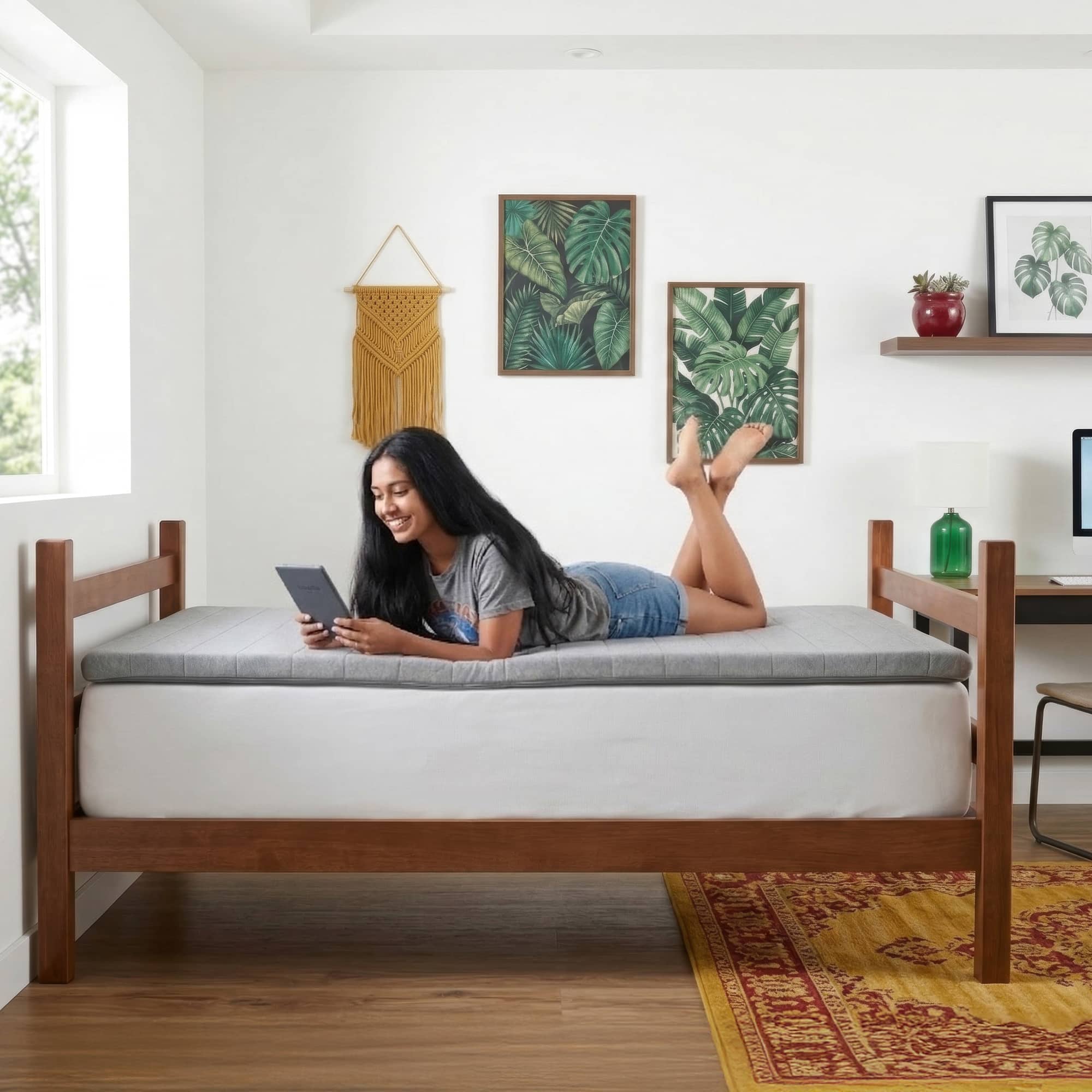 Orders placed by 2pm ships same day. A thick gray mattress topper sitting on top of a bed.