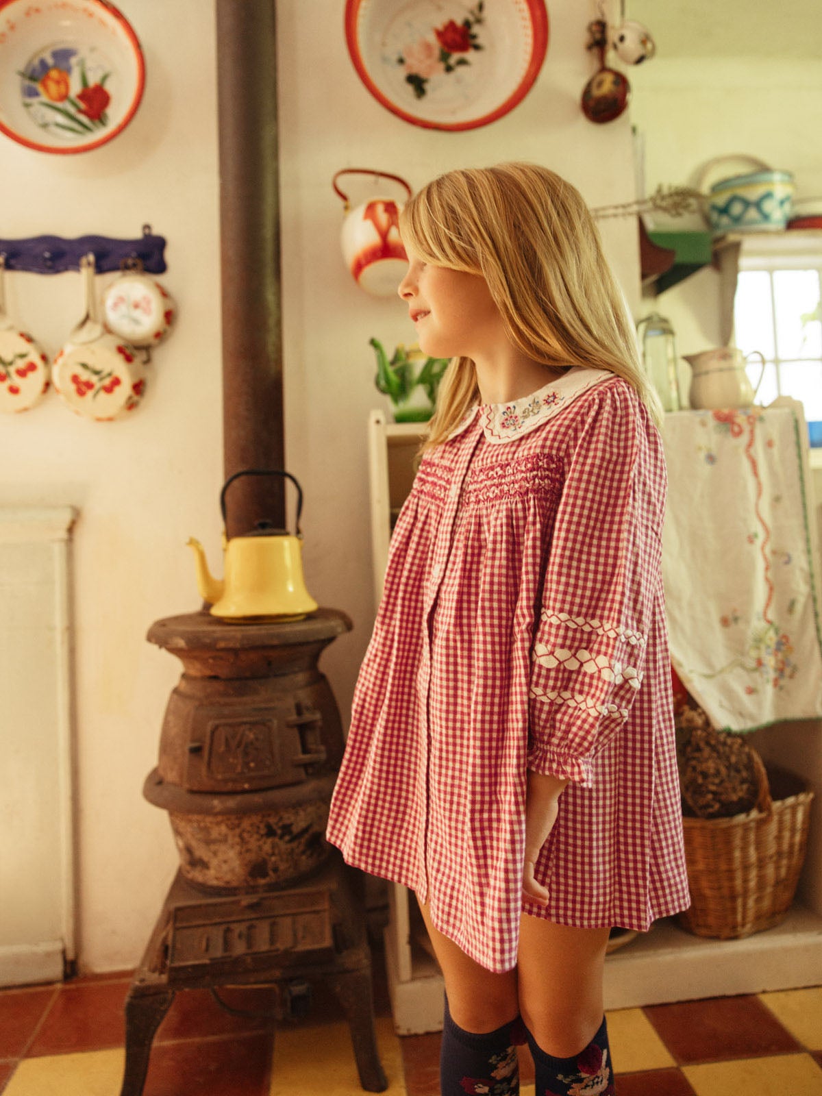 girl wearing red checkered dress