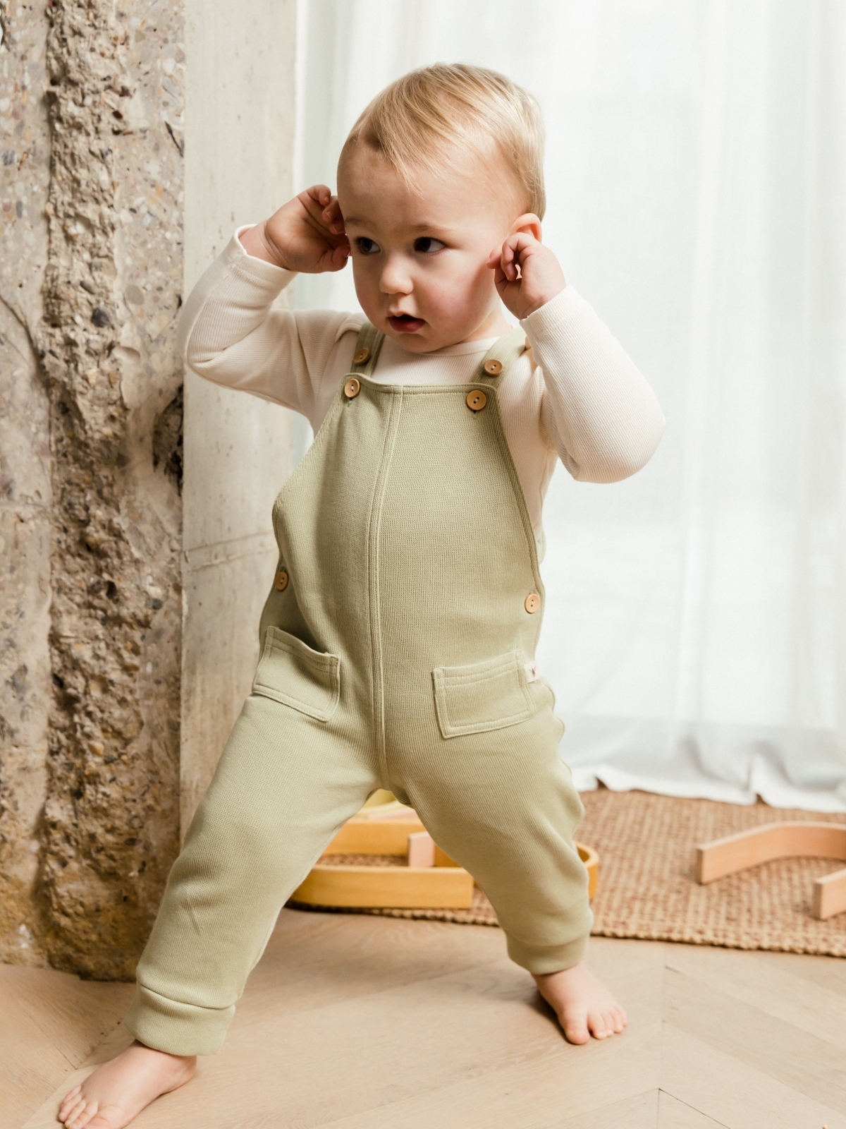 boy wearing UAUA set