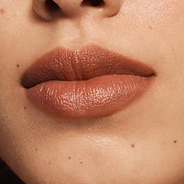 Medium model wearing Graceful Lipstick