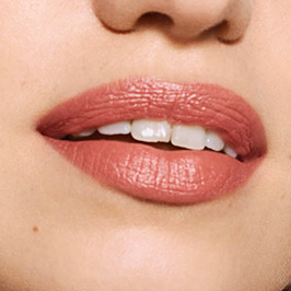Light model wearing Enigmatic Lipstick