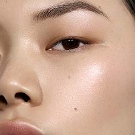 Light model wearing Opalescent Highlighter