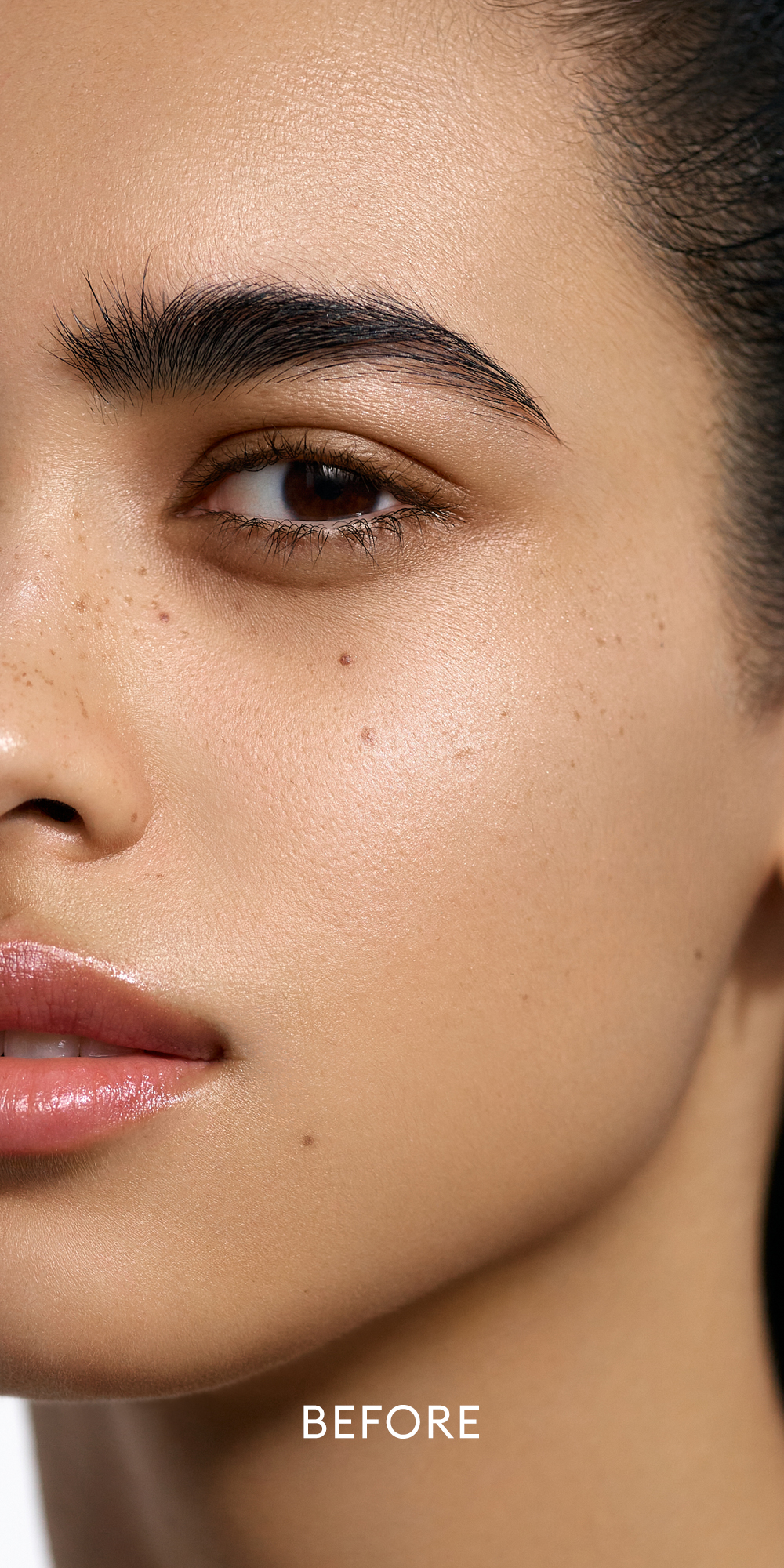Before image of medium skin tone model wearing the Solar Radiance Hydrating Cream Highlight in shade Brilliant 2