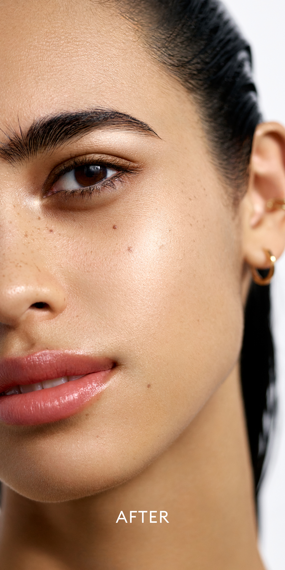 After image of medium skin tone model wearing the Solar Radiance Hydrating Cream Highlight in shade Brilliant 2