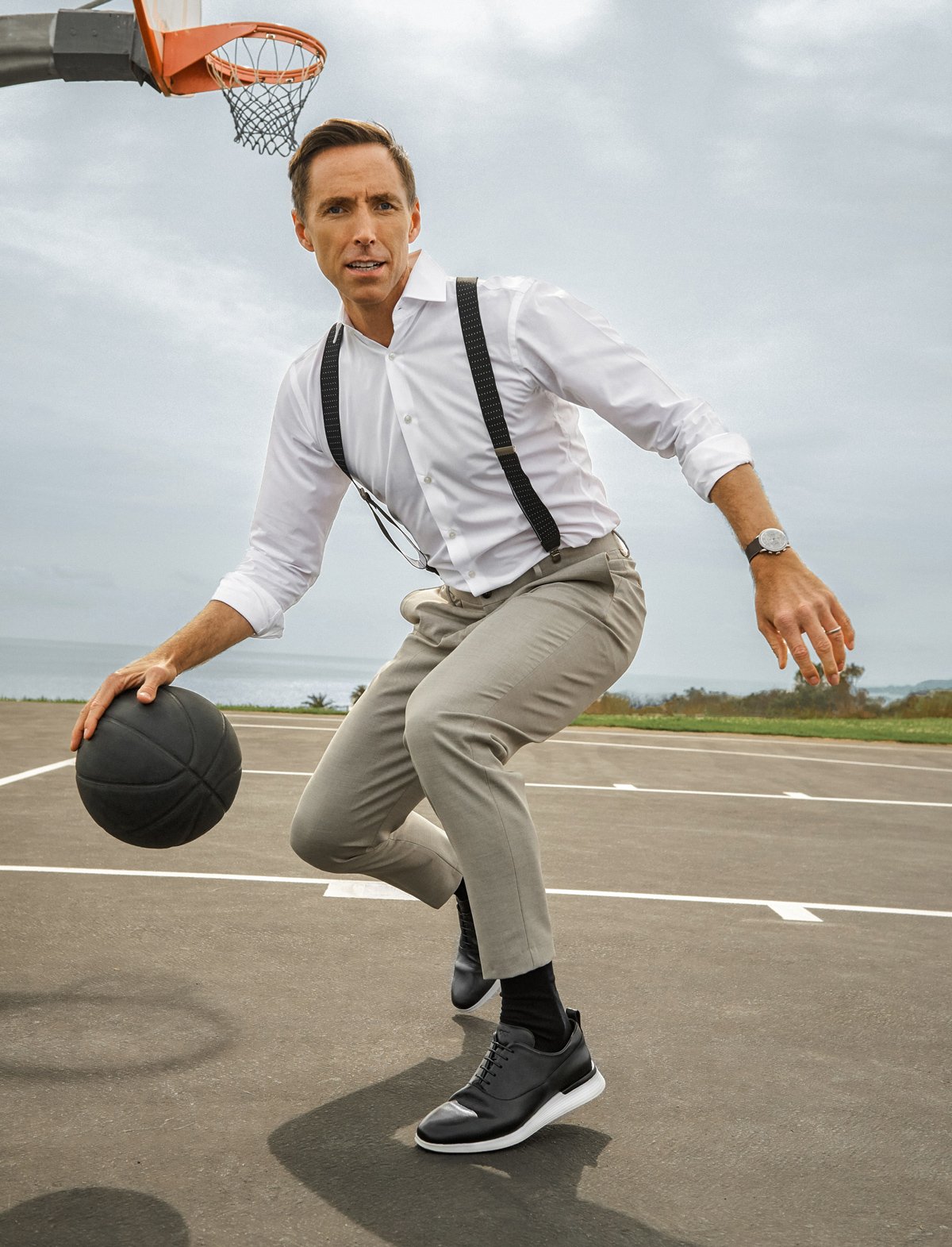 Steve Nash wearing Hybrid Dress Shoe Crossover™ Longwing in Black while playing basketball