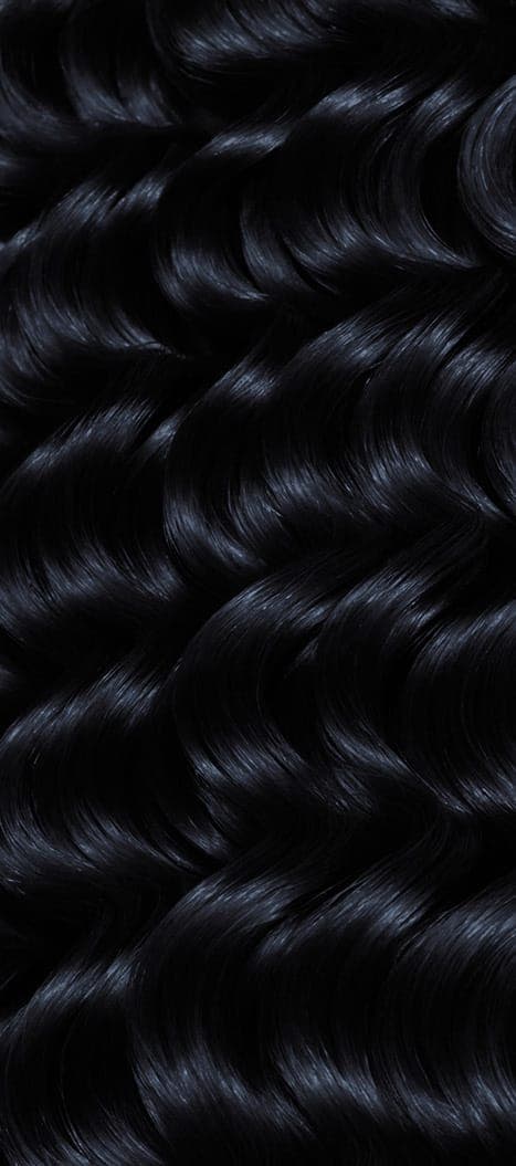 Two bottles and packaging for All About Curls Permanent Color in shade 1B Twilight Twirl.