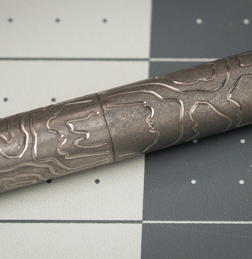 CountyComm MaxMadCo Design Gen 2 Titanium Bolt Action Pen Topographic laser-engraved pattern