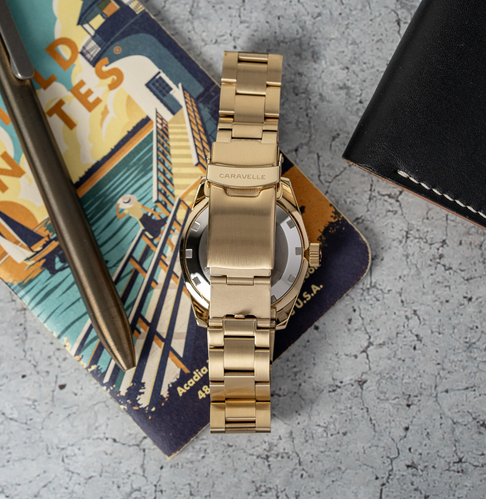 The Caravelle by Bulova Sea Hunter Diver Fold Over Side Button Clasp