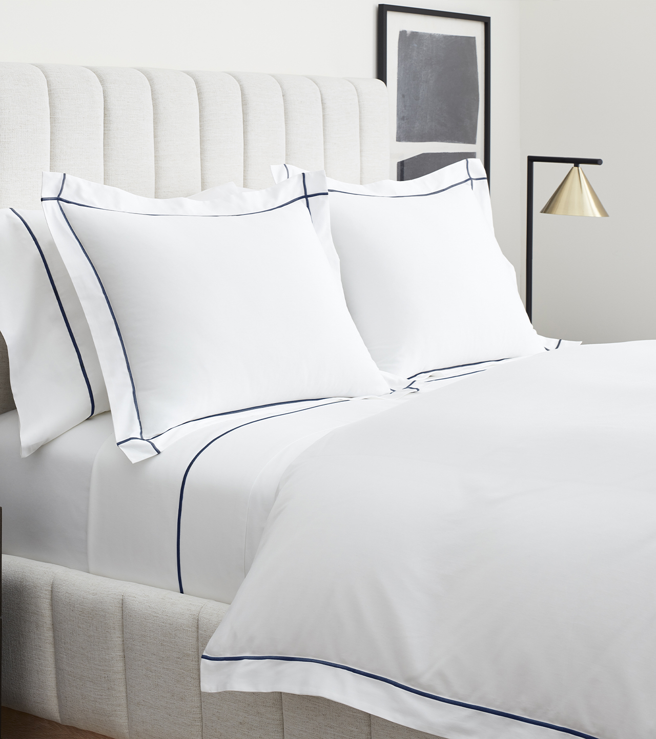 Bed made with Embroidered Sheet & Duvet Set in White/Navy