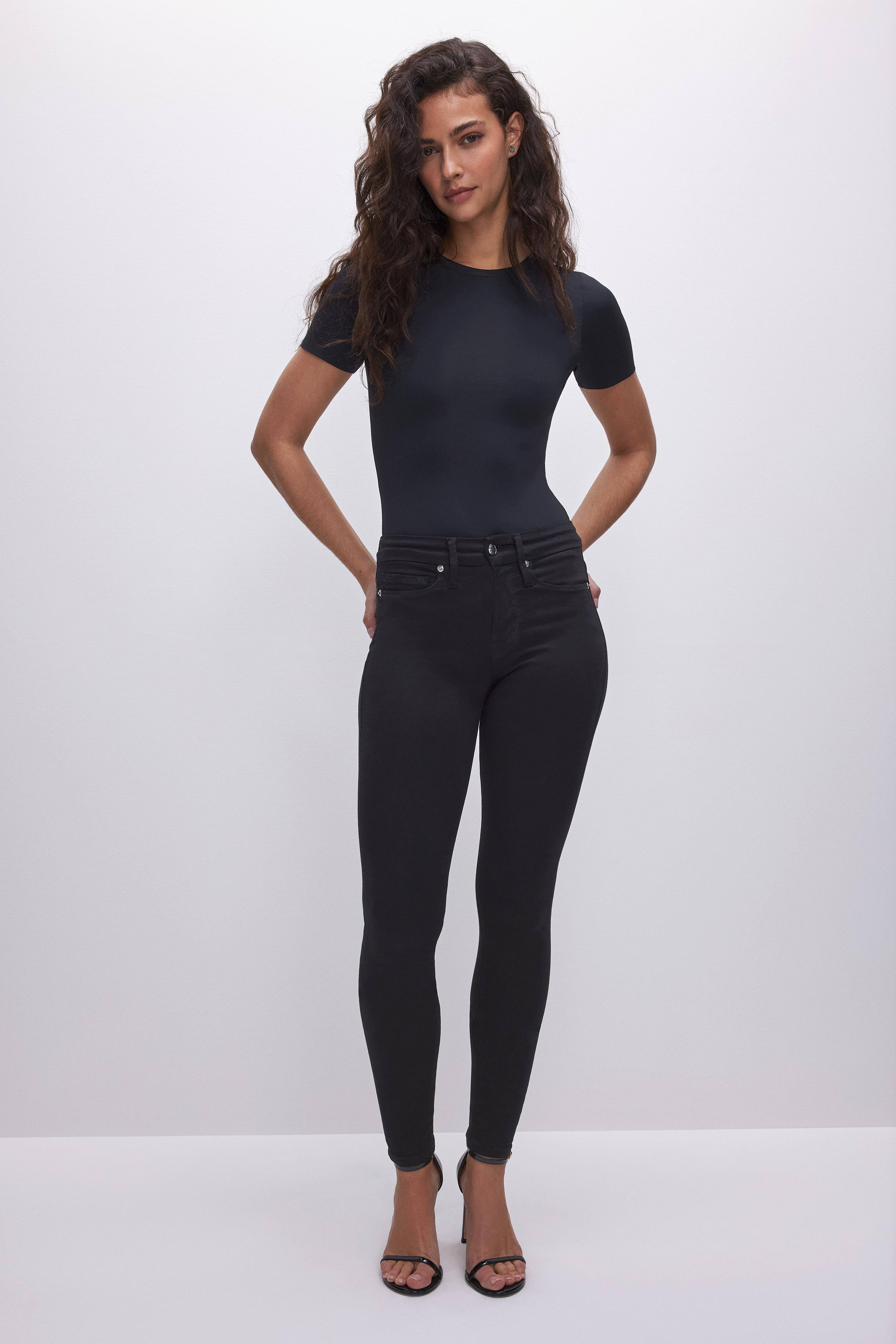 GOOD LEGS JEANS in BLUE224 styled with our SUPER STRETCH BABY TEE in BLACK001, SUPER STRETCH LONG SLEEVE in BLACK001, or STRETCH JERSEY U RING BODYSUIT in BLACK001