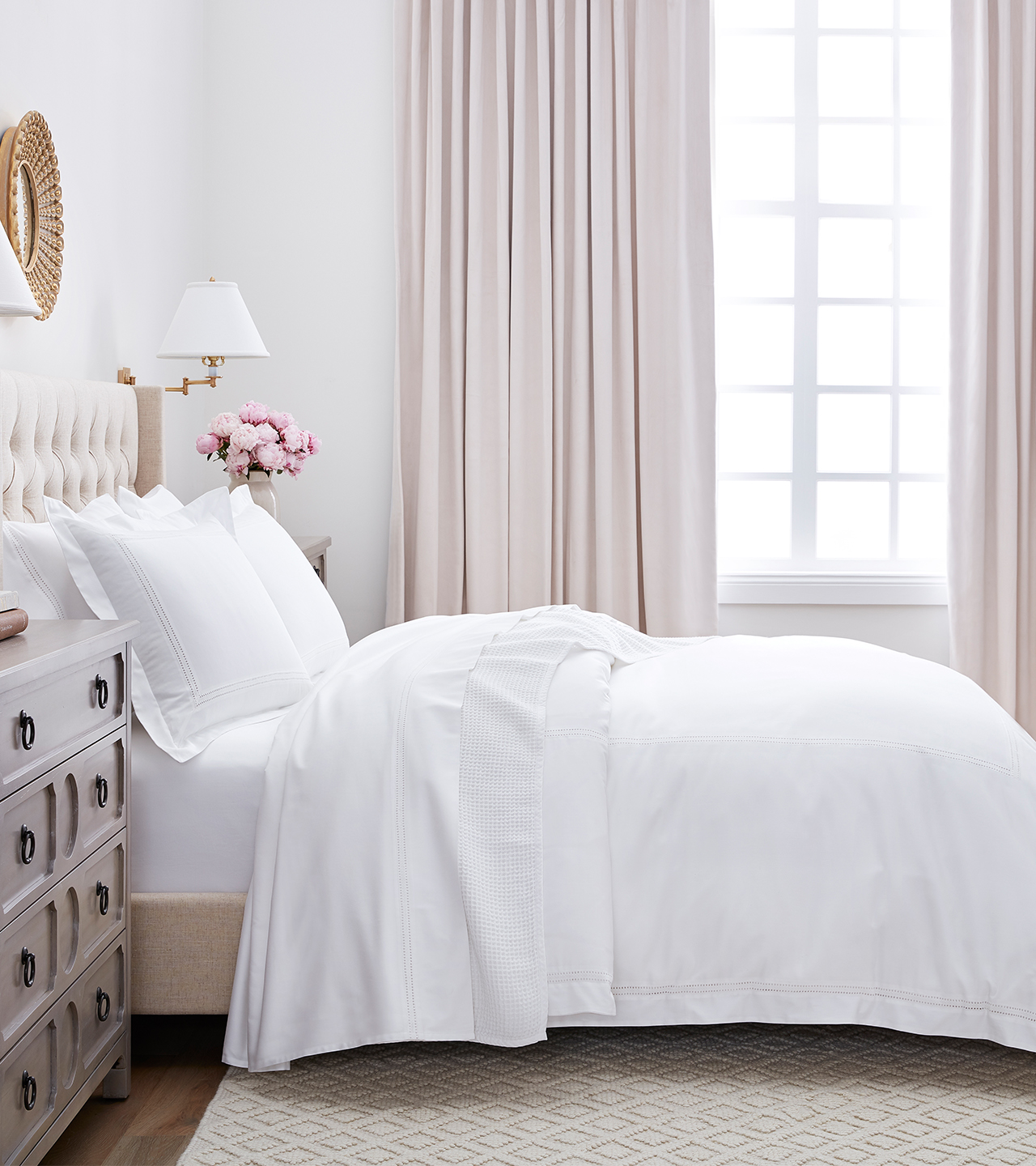 Profile Shot of bed made with Eyelet Duvet & Sheet Set in White
