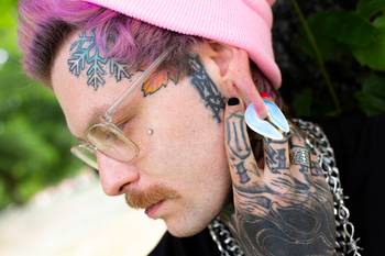 Guy wearing cool Opalite Glass Pincer Keyhole Ear Weights - Pair