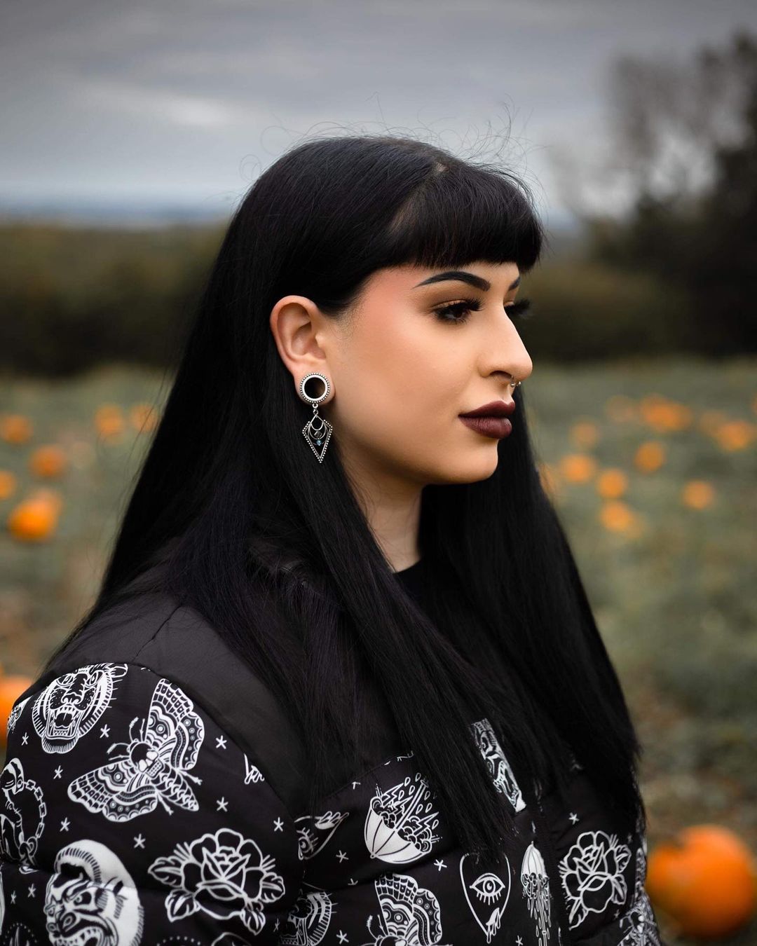 girl wearing cool  Triad Dangle Plug / Gauge