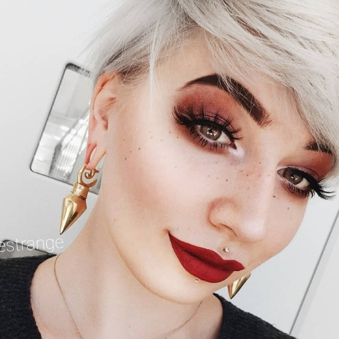 girl wearing fantastic  Pyramid - Brass Ear Weights (Pair)