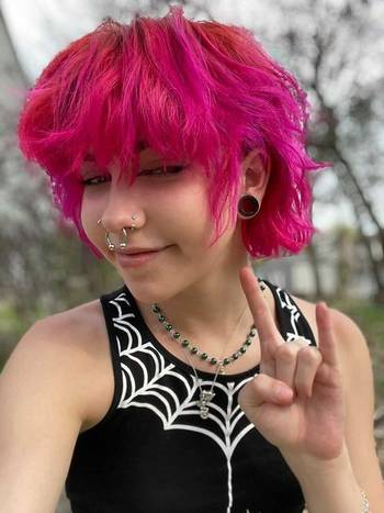 Girl wearing cute Black Screwback Stainless Steel Ear Tunnel