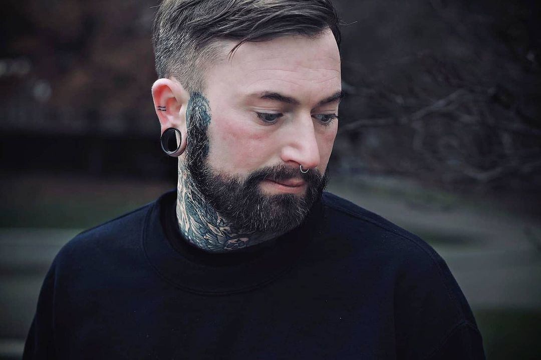 Guy wearing big  Black Double Flare Stainless Steel Tunnel