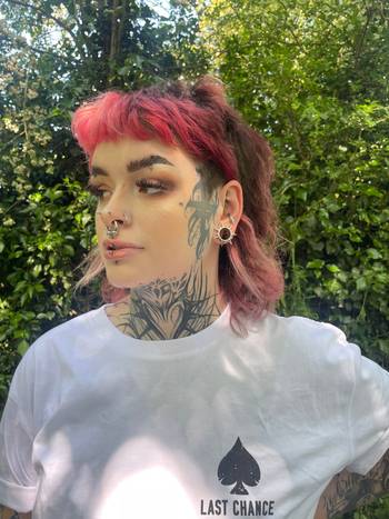 Girl wearing pretty Spiked Screwback Stainless Steel Ear Tunnel