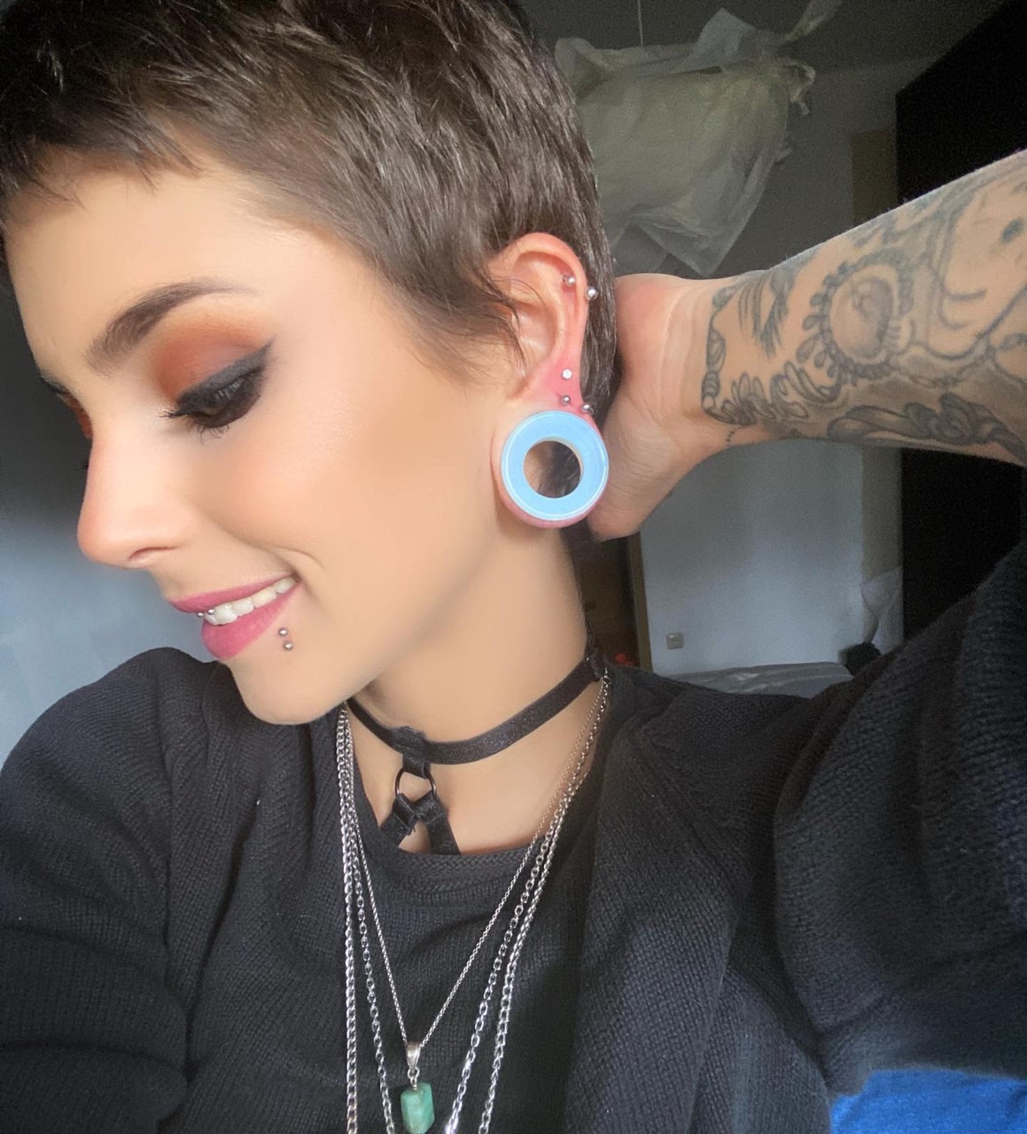 Women wearing alternative  Opalite Glass Ear Tunnel