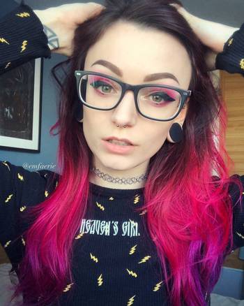 Women wearing large Solid Black Silicone Ear Stretching Plug / Gauge