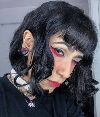 Female wearing cool Blood Globe Double Flare Acrylic Ear Plug / Gauge