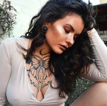 Women wearing alternative Black Ebony Convex Wood Ear Plug / Gauge